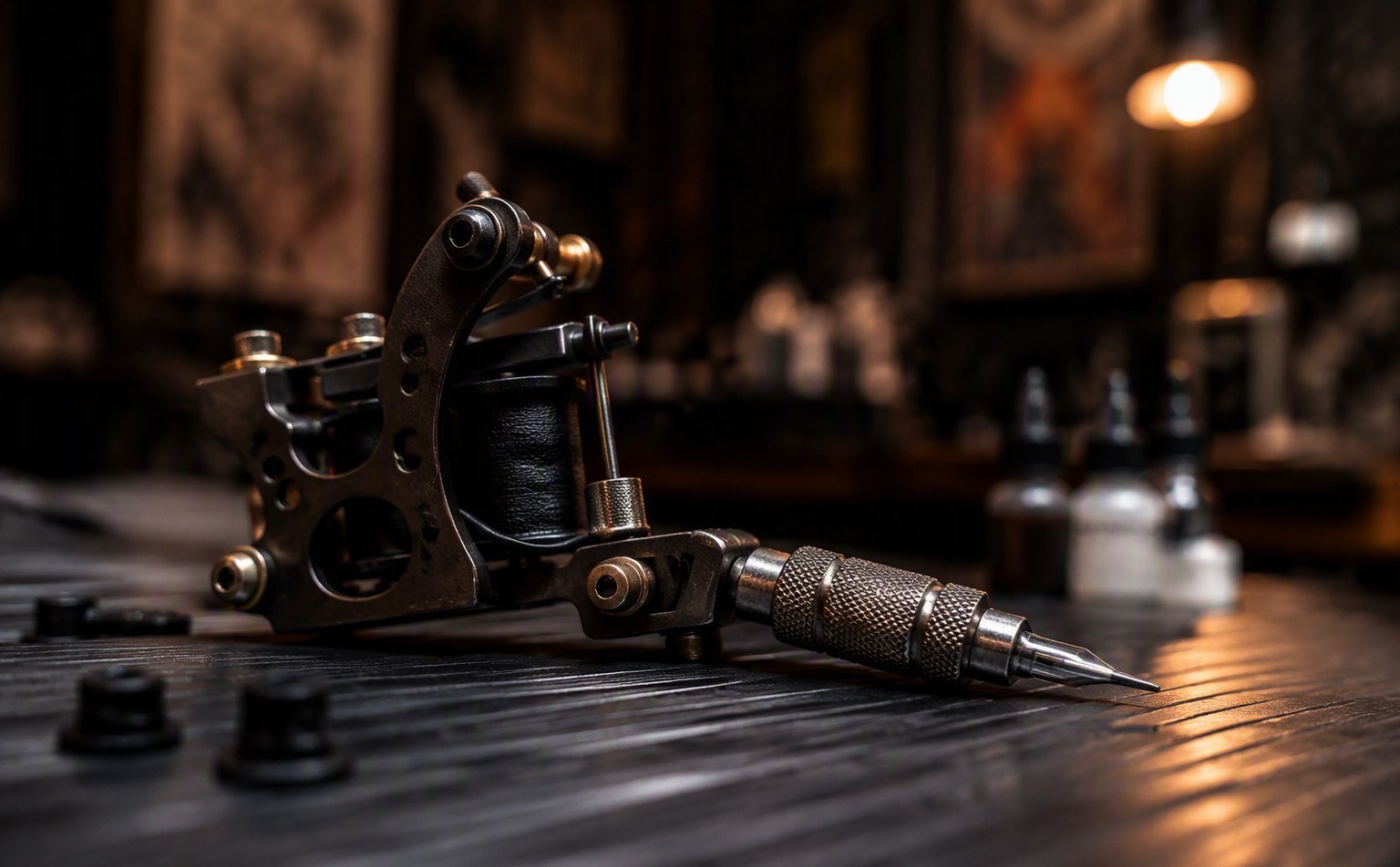 Classic coil tattoo machine with a traditional needle on bar