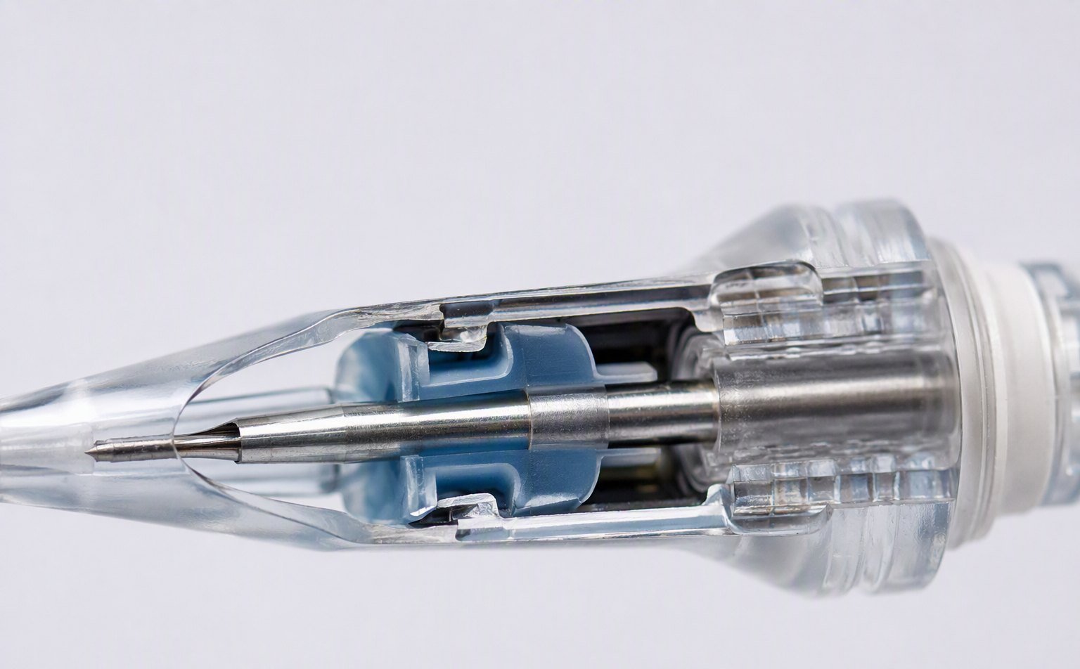 Cutaway view of a membrane-sealed tattoo needle cartridge